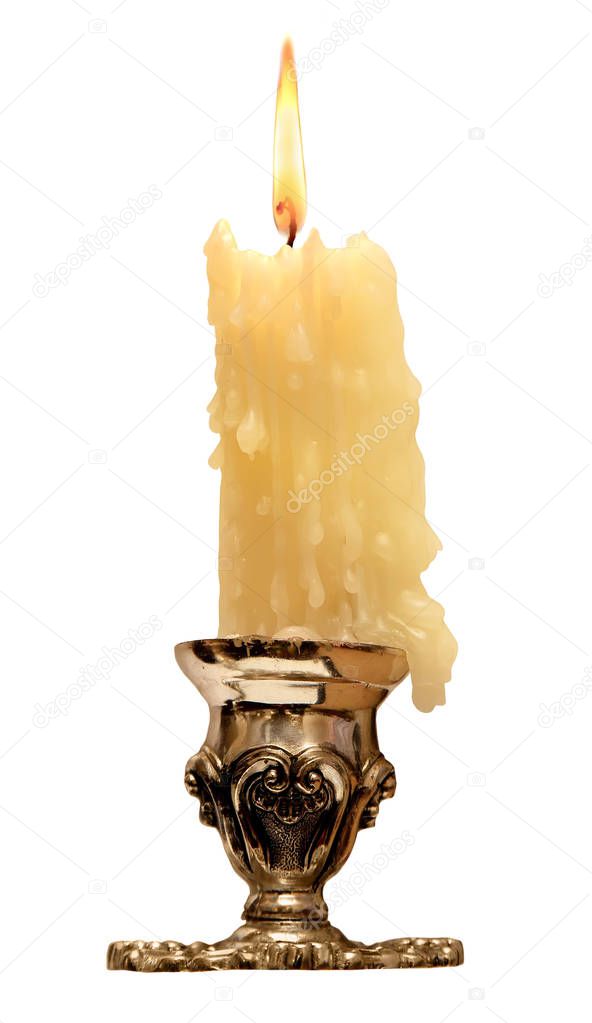 burning old candle vintage bronze Silver candlestick. Isolated On White Background.