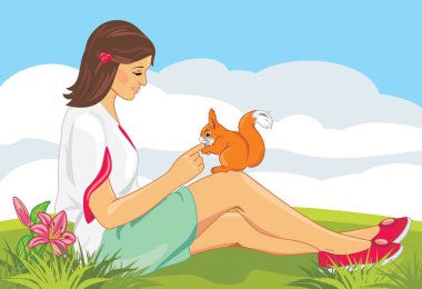 Sevimli kız bir sincap besleme