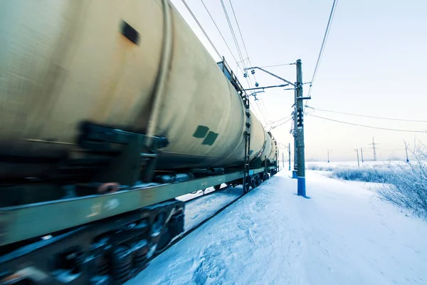 Winter railway and train with cargo. — Stock Photo, Image