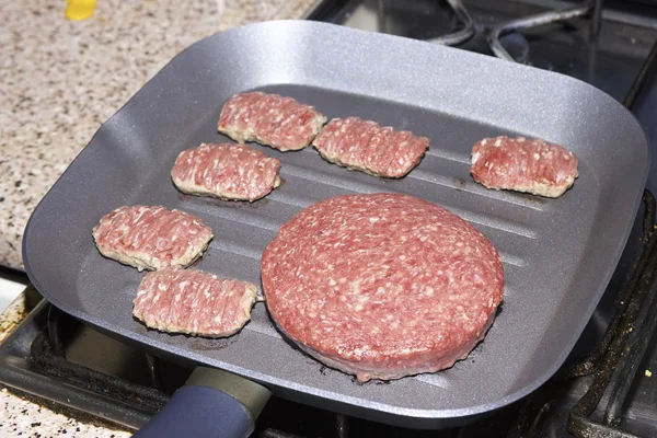 Delicious uncooked hamburger — Stock Photo, Image
