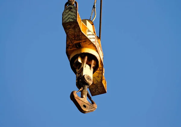 Detail of yellow crane hook — Stock Photo, Image