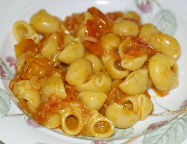 Detail of italian psta with tomato sauce — Stock Photo, Image