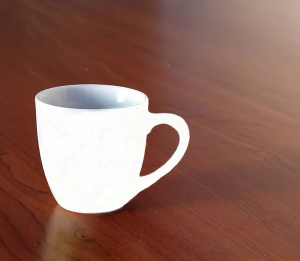 Detail of coffe cup on top a wooden table — Stock Photo, Image