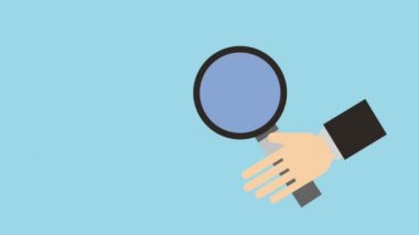 Büyüteç camı simgeler tutan el