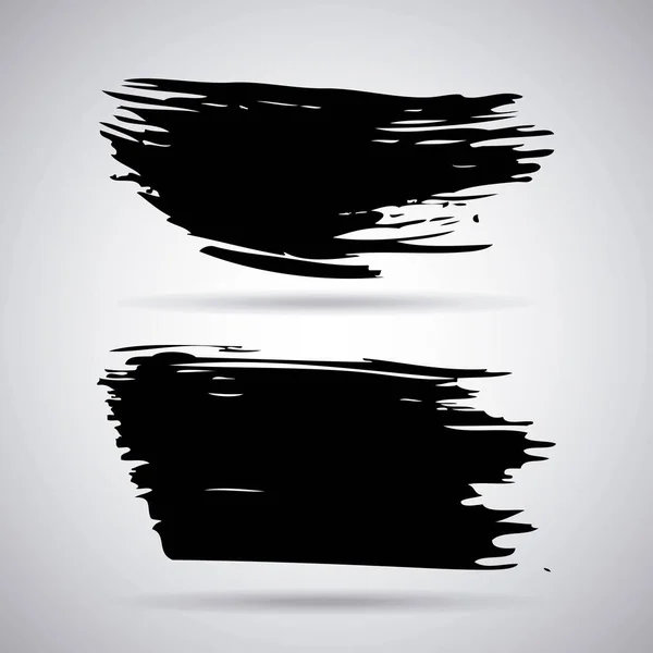 Set di pennellate artistiche nere fatte a mano inchiostro creativo pennellate isolate su sfondo bianco — Vettoriale Stock