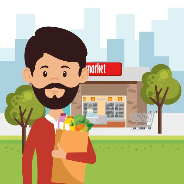 Hombre con supermercado comestibles en bolsa de compras — Vector de stock