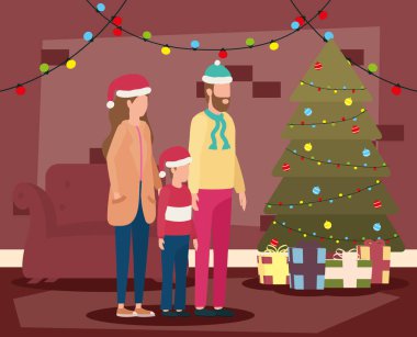 Ebeveynler ve oğulları Noel 'i ağaç ile oturma odasında kutluyorlar.
