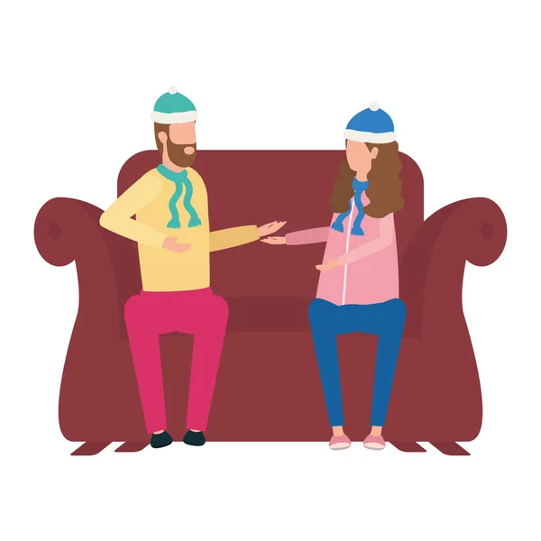 Jeune couple amoureux avec chapeau de Noël assis dans le canapé — Image vectorielle