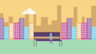 Genç çift parkta dizüstü bilgisayar kullanarak