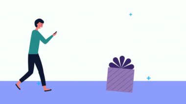 Genç işadamı akıllı telefon ve hediye kullanıyor.