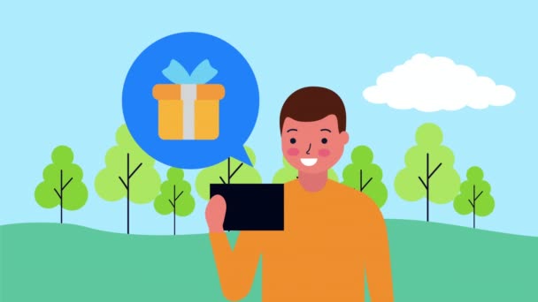 Ung affärsman använder smartphone med presentförpackning — Stockvideo