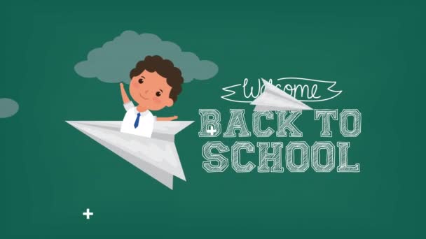 Back to school season with boy flying in paper airplane — Stock Video