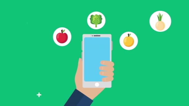 Main en utilisant un smartphone avec des aliments frais et sains — Video