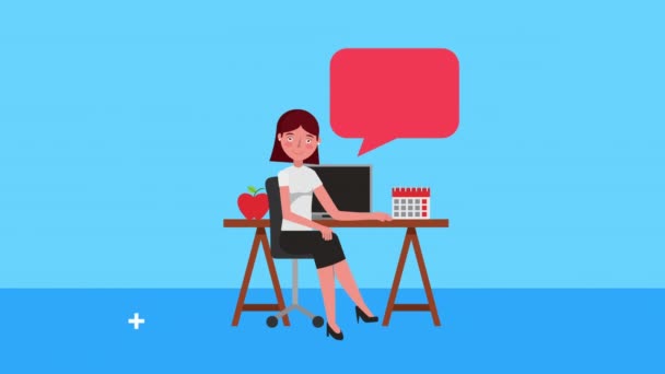 Young businesswoman in the office working with speech bubble — Stock Video