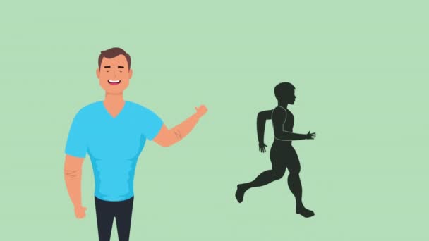 Young man with healthy life style and silhouette running — Stock Video