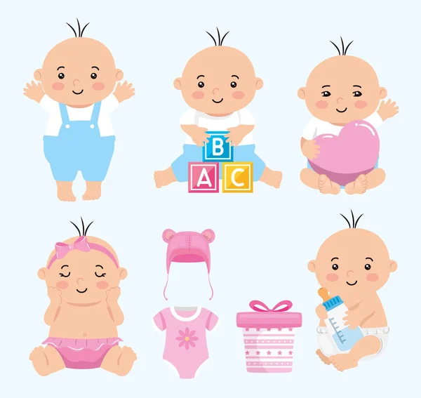 Group of cute babies and icons — Stock Vector