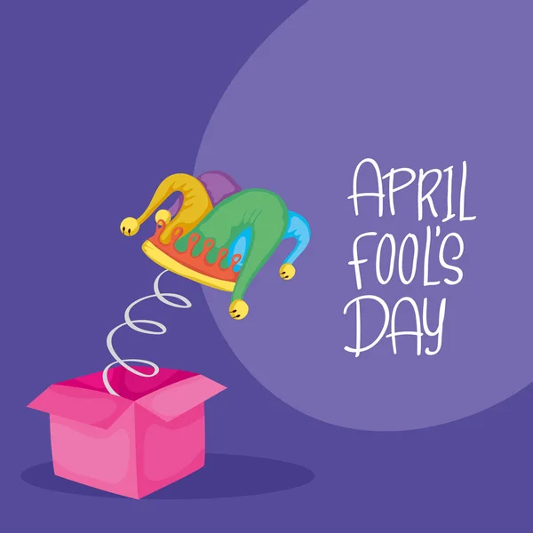 Happy april fools day card with surprise box and buffoon hat — Stockvektor