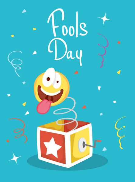 Χαρούμενη κάρτα April ανόητοι ημέρα με κουτί έκπληξη και τρελό emoji — Διανυσματικό Αρχείο