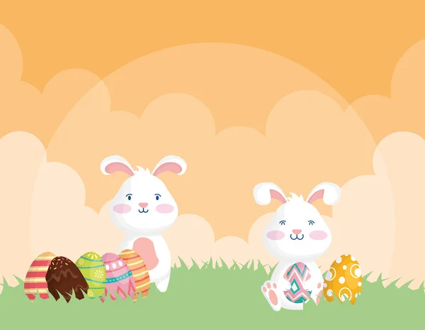 Happy easter celebration card with rabbits and eggs painted — Stock Vector