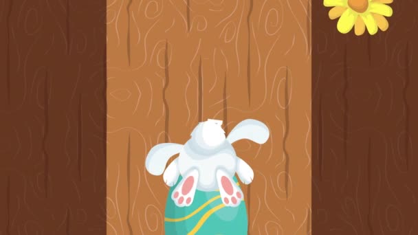 Счастливая пасхальная анимированная карта с кроликом и яйцом окрашены в цветочную рамку — стоковое видео