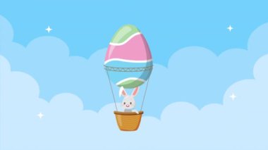 Yumurta boyalı balon içinde tavşan olan mutlu Paskalya animasyon kartları.