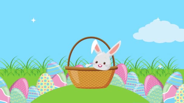 Gelukkige Pasen geanimeerde kaart met konijn in mand en eieren geschilderd — Stockvideo