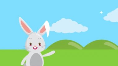 Mutlu Paskalya animasyon kartları ve tarlada tavşan var.