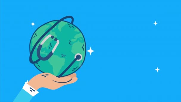 Internationale gezondheidsdag met de hand tillen van de wereld planeet en stethoscoop — Stockvideo