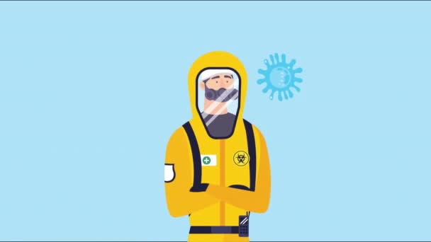 생물 안전 슈트를 입고 열심 히 일하는 19 개의 입자를 가진 사람 — 비디오
