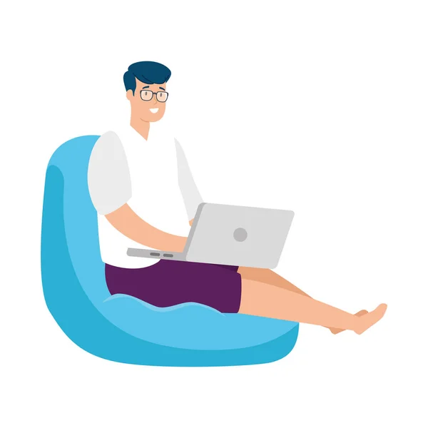 Mężczyzna siedzi w pufie z laptopem — Wektor stockowy