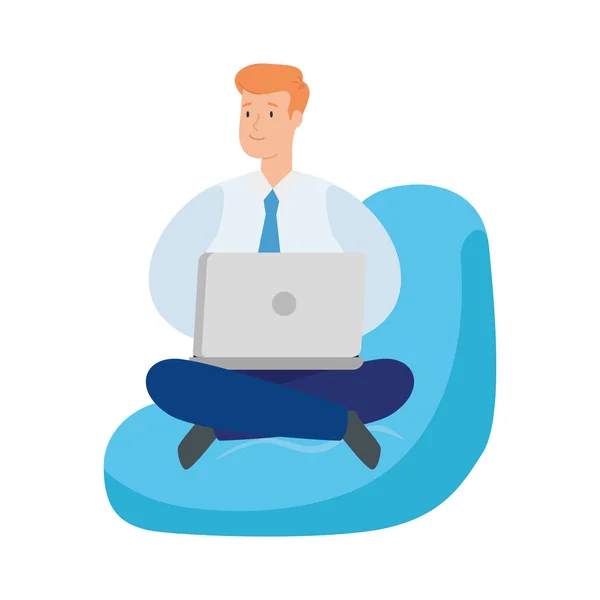 Businessman sitting in pouf with laptop — Stock Vector
