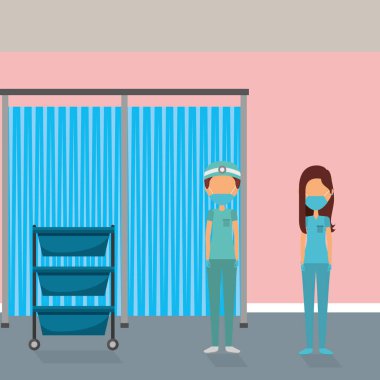 Doktor çift iş yerinde maske takıyor.