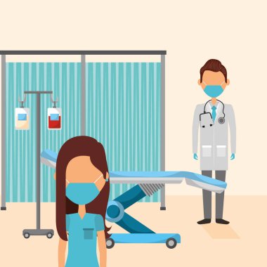 Doktor çift iş yerinde maske takıyor.