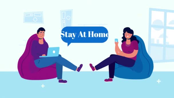 Koppel met behulp van technologie in sofa verblijf thuis campagne — Stockvideo
