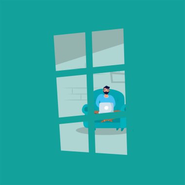 Kanepede dizüstü bilgisayar kullanan adam seçim kampanyasında kalıyor.