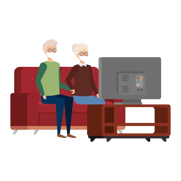 Abuelos pareja usando mascarilla viendo televisión — Archivo Imágenes Vectoriales