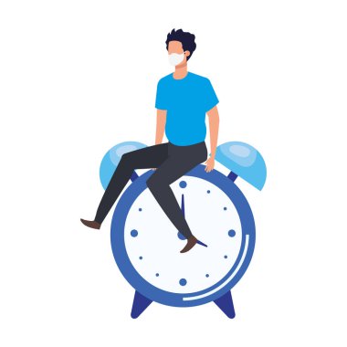 Delikanlı korku içinde otururken maske takıyor.