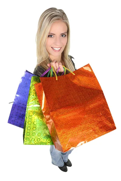 Senhora de compras com sacos coloridos — Fotografia de Stock