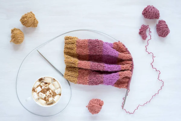 Coffee and knitting on white background — Stock Photo, Image