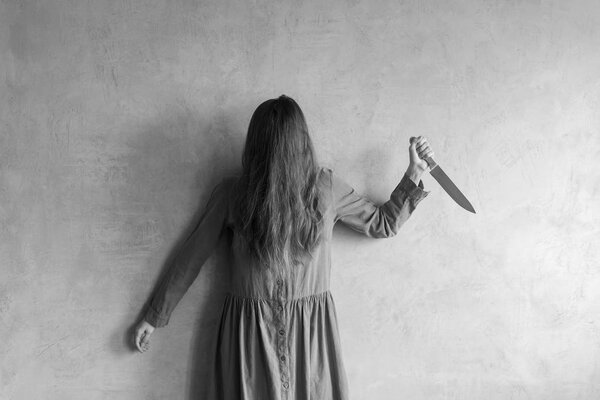 Furious woman with a knife