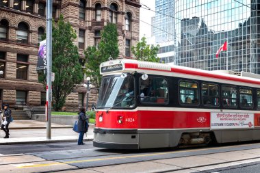 Toronto street and vintage red tramway