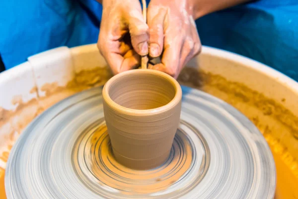 Pottering - creating a clay cup — Stock Photo, Image