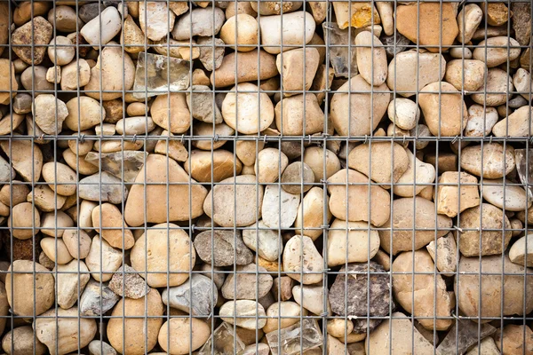 Piedras en red metálica — Foto de Stock