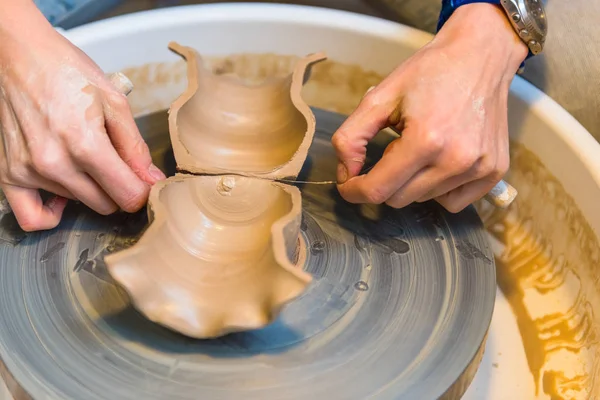 Hands creating an earthen jar — Stock Photo, Image