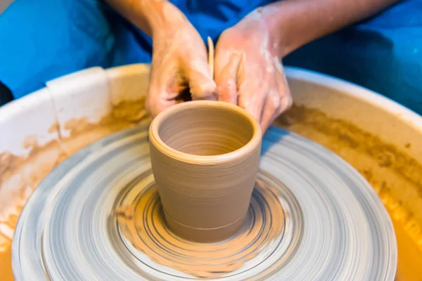 Pottering - creating a clay cup in process — Stock Photo, Image