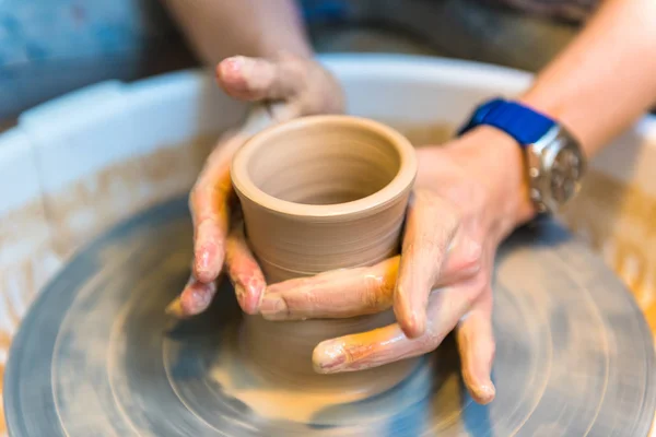 Pottering - creating a clay cup in process — Stock Photo, Image