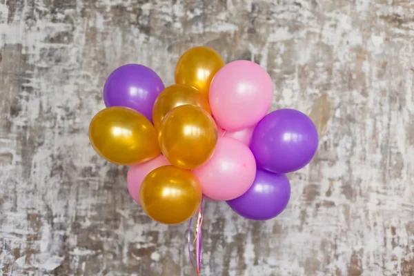 Balloons bunch against wall — Stock Photo, Image
