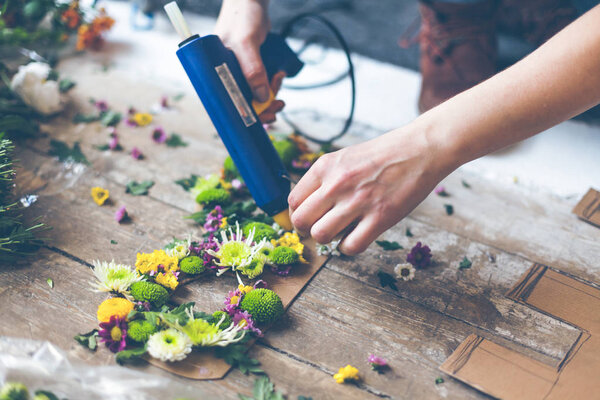 Florist making flower decoration