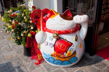 Chinese lucky cat figurine clipart