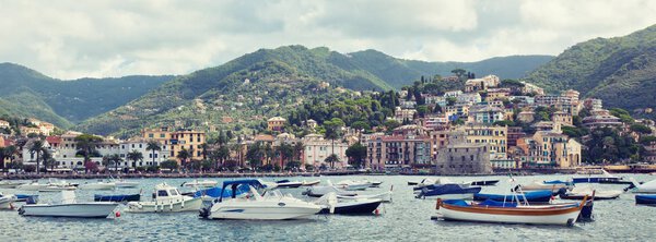 View of town Rapallo from the sea, Italy. Long wide toned banner